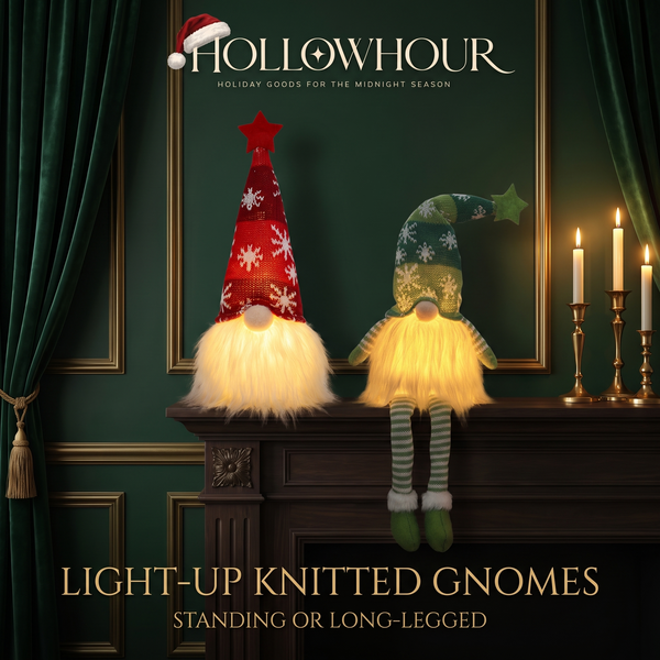 A red standing knitted gnome and a green long-legged sitting gnome glowing on a dark wooden mantel