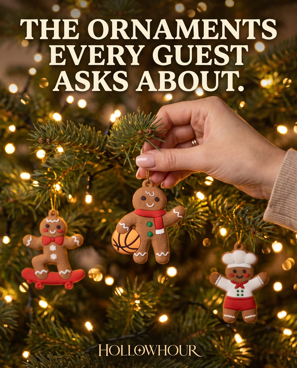 A hand hanging a gingerbread ornament on a glowing Christmas tree