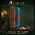 LED curtain lights glowing in a rainbow gradient across a window in a dark green panelled room, with the app and remote on a side table